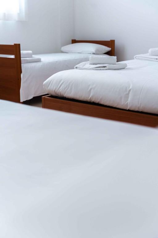 Postel nebo postele na pokoji v ubytování Wayco Rooms