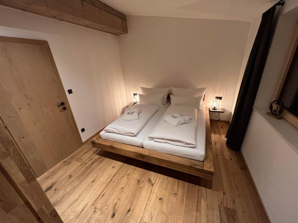 Postel nebo postele na pokoji v ubytování Appartements Plus