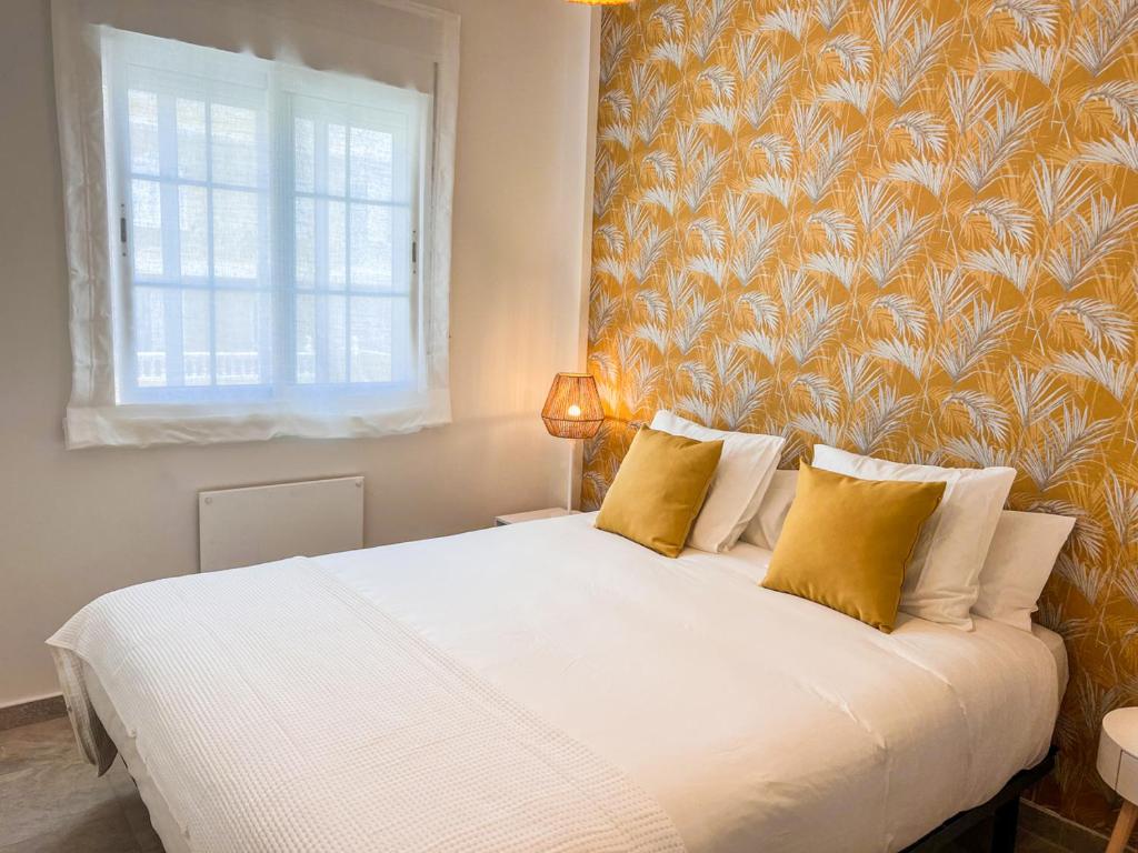 Postel nebo postele na pokoji v ubytování Tarifa Cozy House PALM BEACH