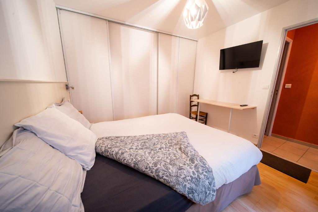 Łóżko lub łóżka w pokoju w obiekcie Appartement haut de gamme Centre ville