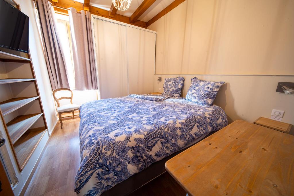 Łóżko lub łóżka w pokoju w obiekcie Appartement haut de gamme Centre ville
