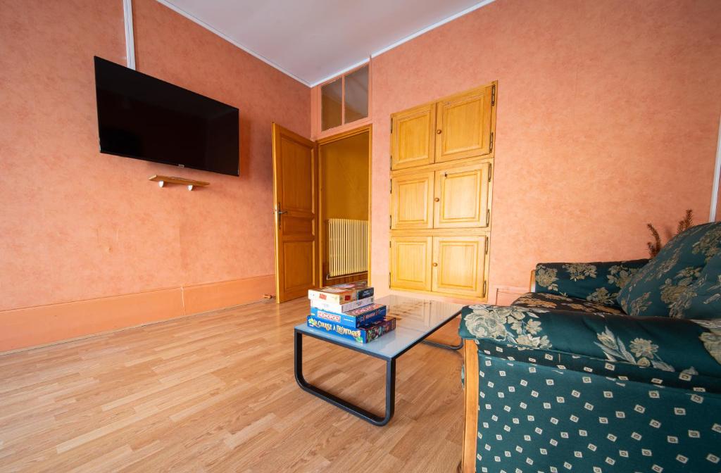 Telewizja i/lub zestaw kina domowego w obiekcie Appartement haut de gamme Centre ville
