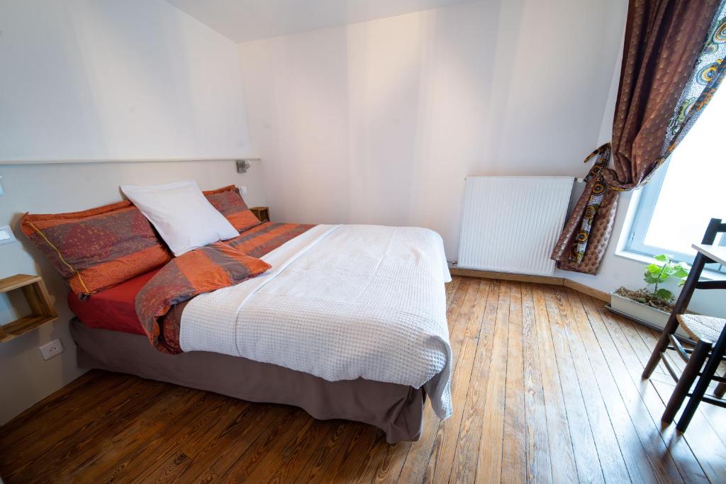 Łóżko lub łóżka w pokoju w obiekcie Appartement haut de gamme Centre ville