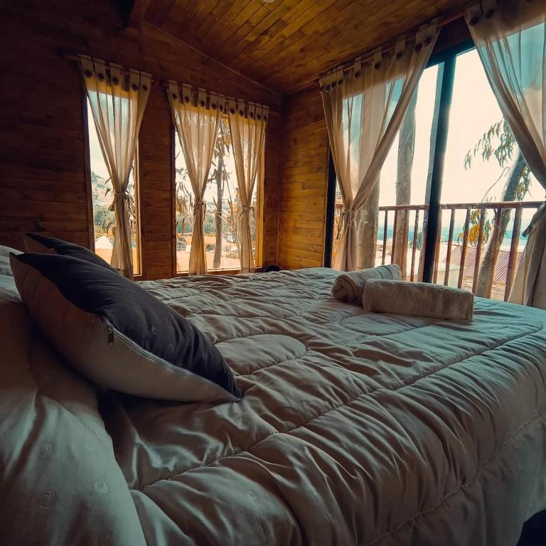 Postel nebo postele na pokoji v ubytování Casa en el Árbol Guatavita