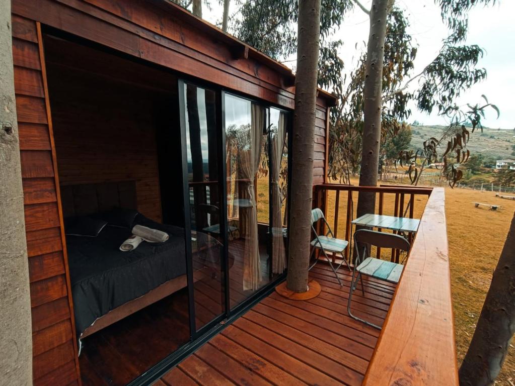 Balkón nebo terasa v ubytování Casa en el Árbol Guatavita
