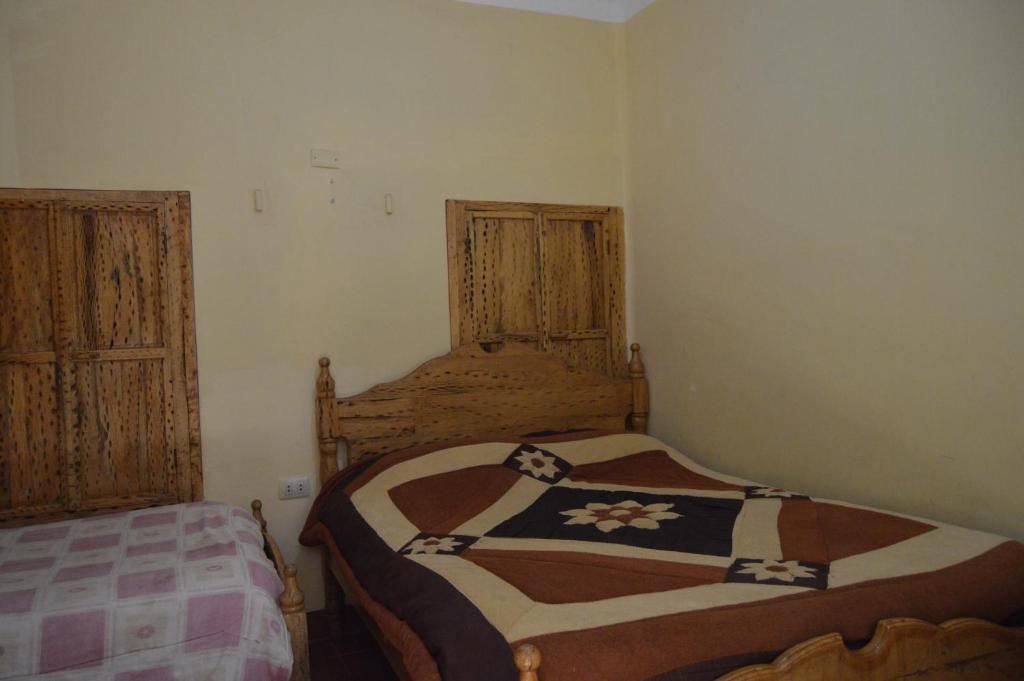 Hostal Coronel Pedro Arraya客房内的一张或多张床位