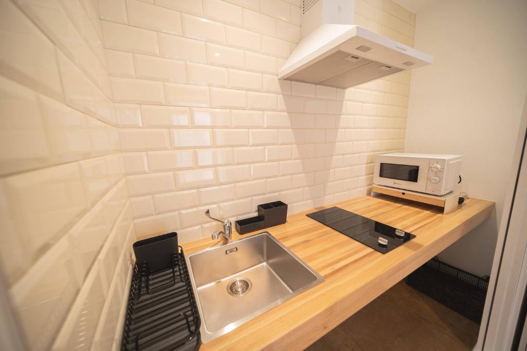 Kuchyňa alebo kuchynka v ubytovaní APARTAMENTOS CASA ARADIÑA