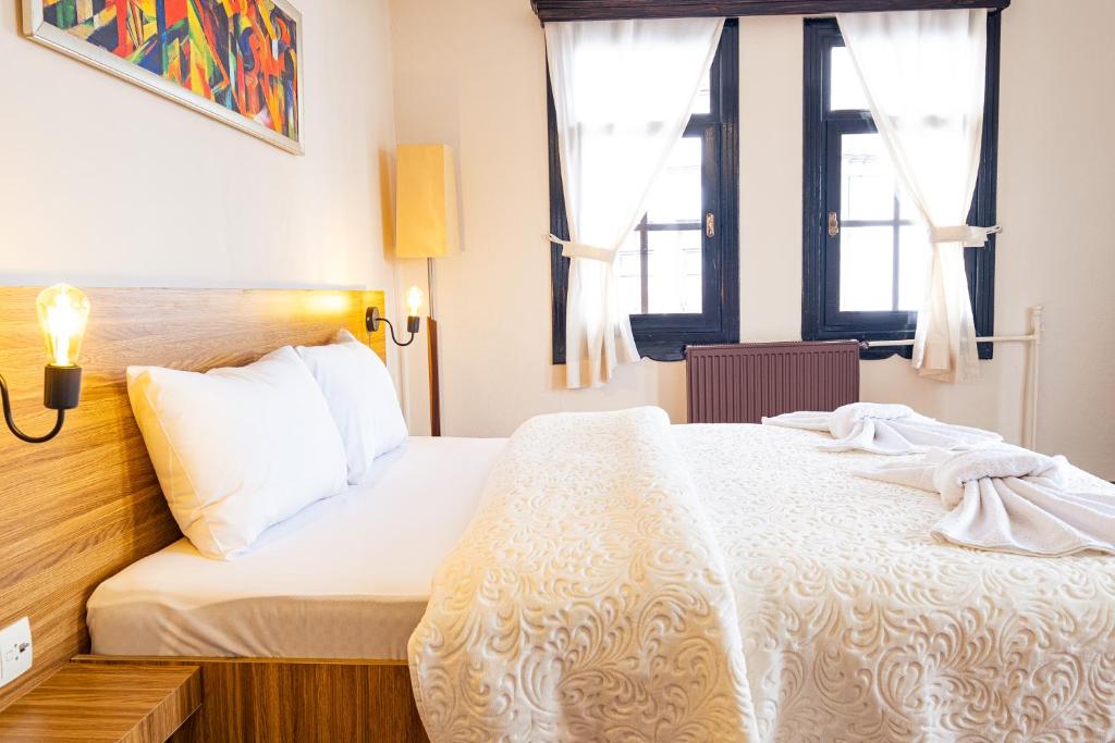 Postel nebo postele na pokoji v ubytování Simre Inn Hotel Safranbolu