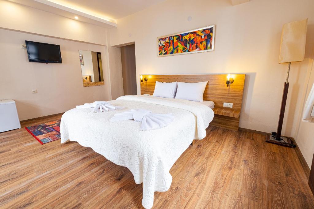 Postel nebo postele na pokoji v ubytování Simre Inn Hotel Safranbolu
