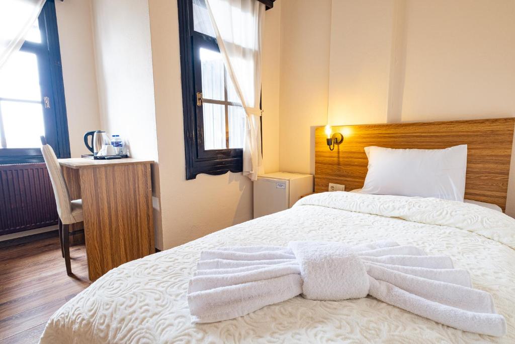 Postel nebo postele na pokoji v ubytování Simre Inn Hotel Safranbolu