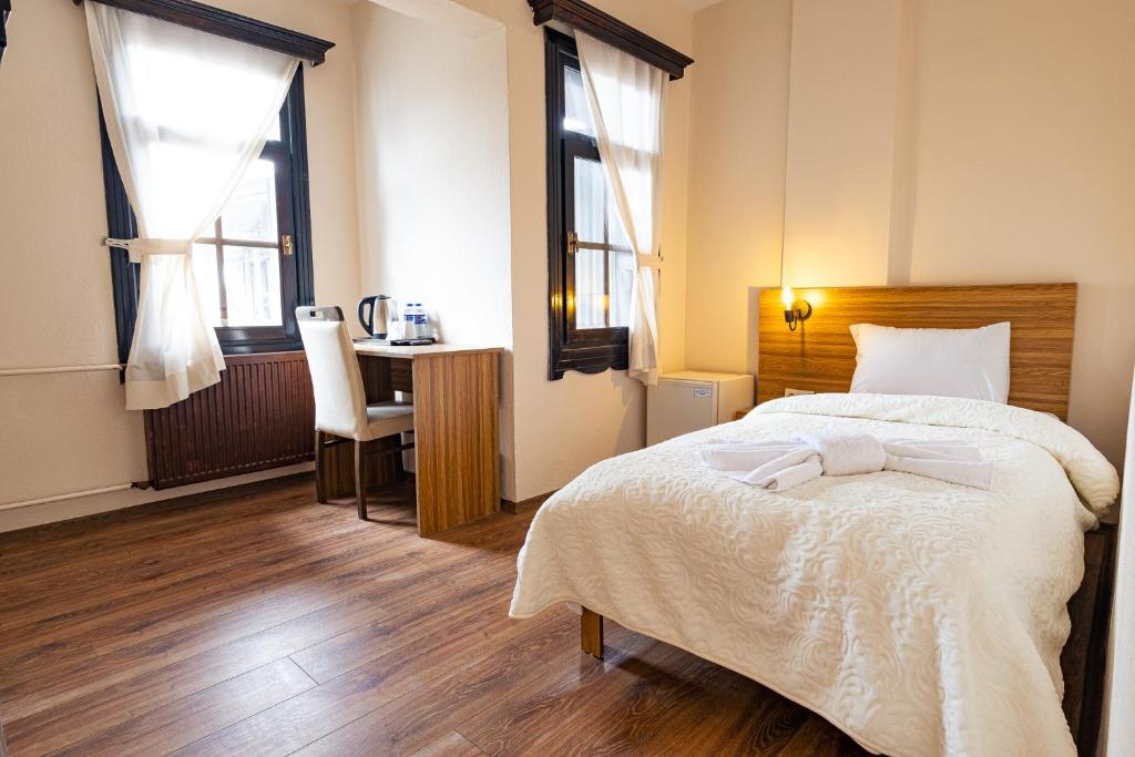 Postel nebo postele na pokoji v ubytování Simre Inn Hotel Safranbolu