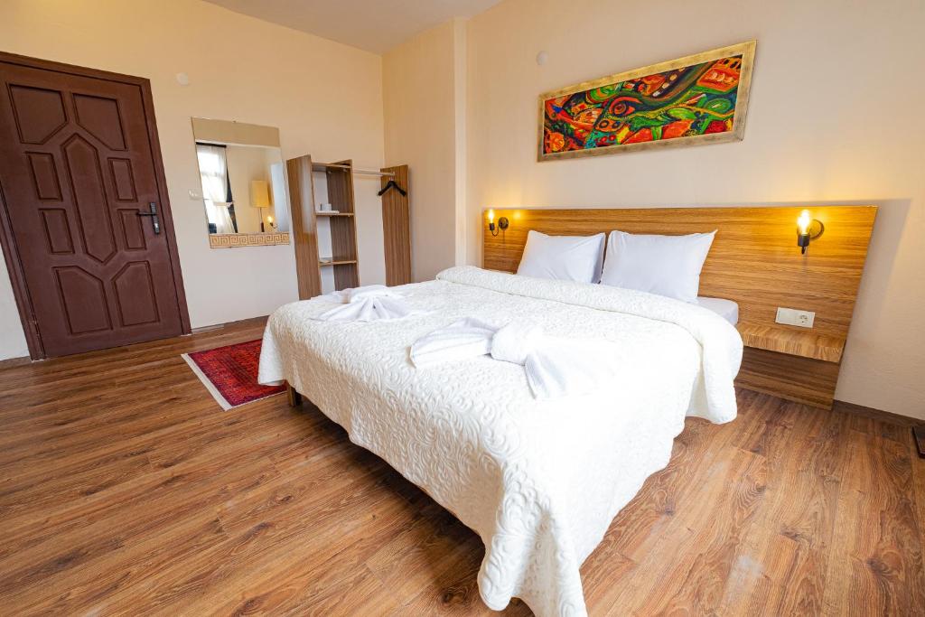 Postel nebo postele na pokoji v ubytování Simre Inn Hotel Safranbolu