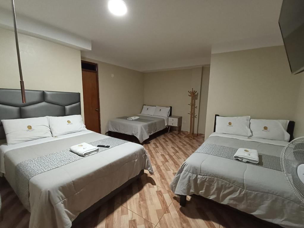 Postel nebo postele na pokoji v ubytování HOTEL MAR Y LAGO