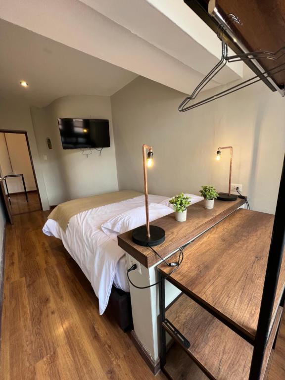 TV a/nebo společenská místnost v ubytování Hostal María Angola