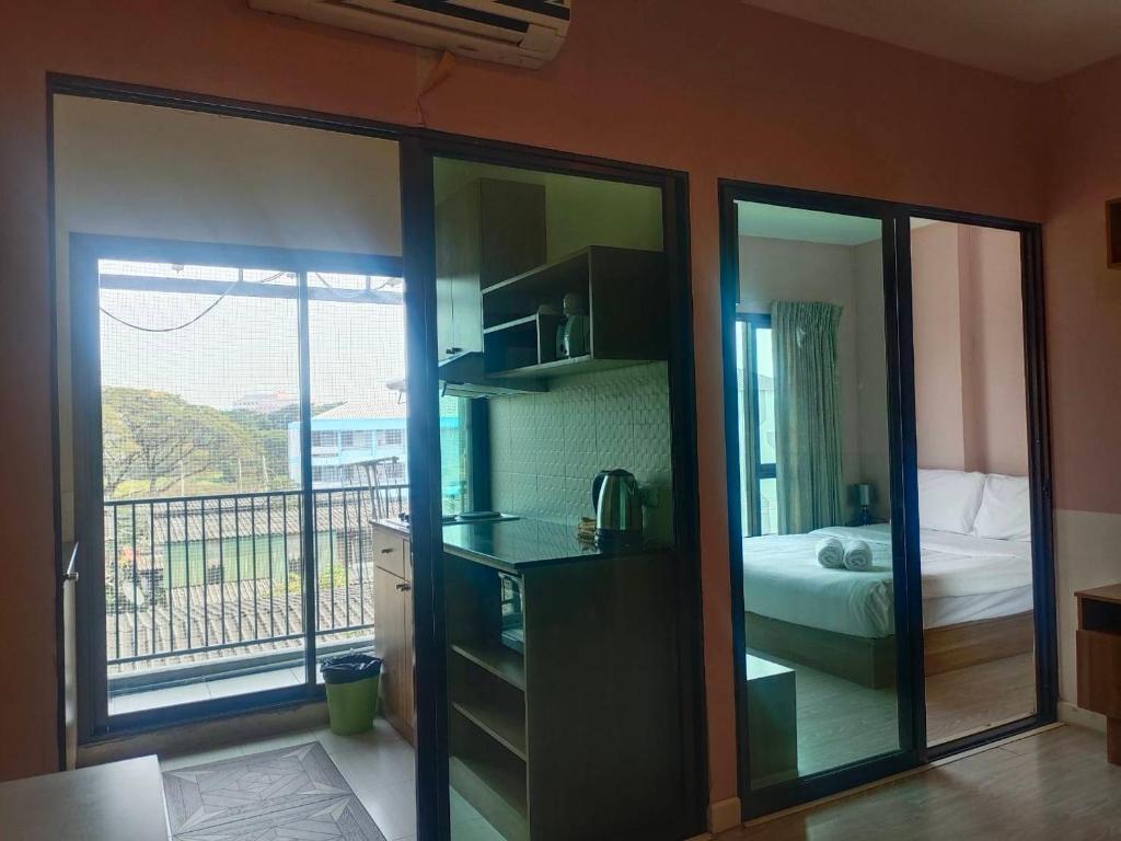 Deluxe Room at Tree Boutique Condo by Suwan Style Agency