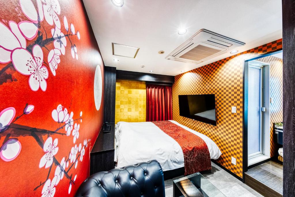TV a/nebo společenská místnost v ubytování Hotel Lotus Umeda -Adult Only