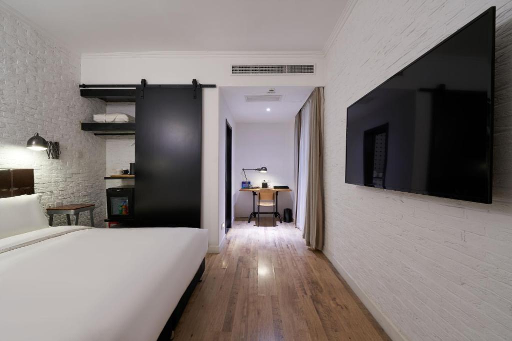 TV a/nebo společenská místnost v ubytování Yi Stack Hotel Beijing