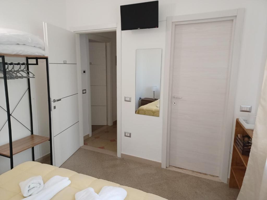 Postel nebo postele na pokoji v ubytování La Dimora dei Professori DiffusHotel