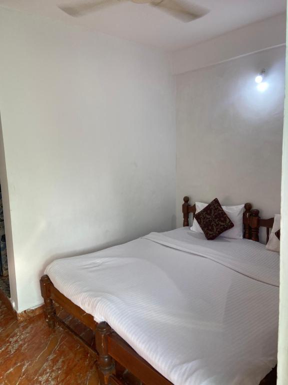 Postel nebo postele na pokoji v ubytování Seaway inn guesthouse