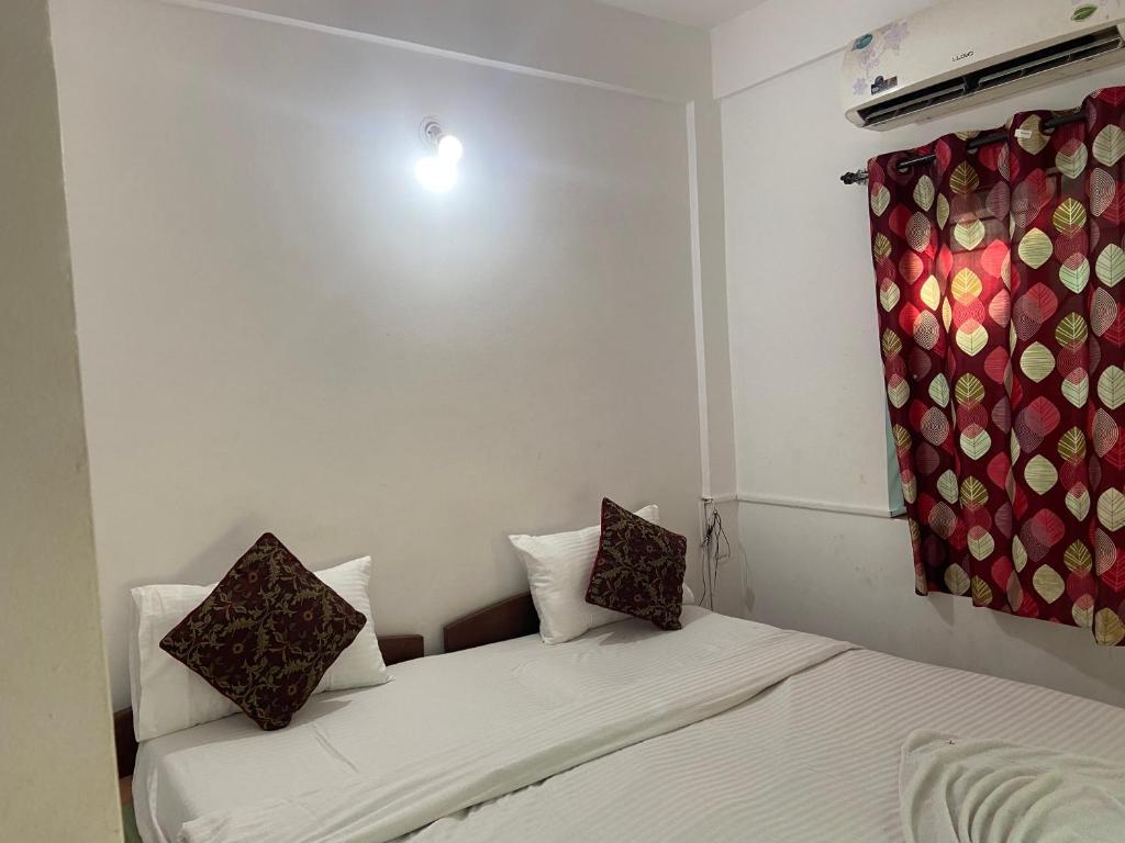 Postel nebo postele na pokoji v ubytování Seaway inn guesthouse