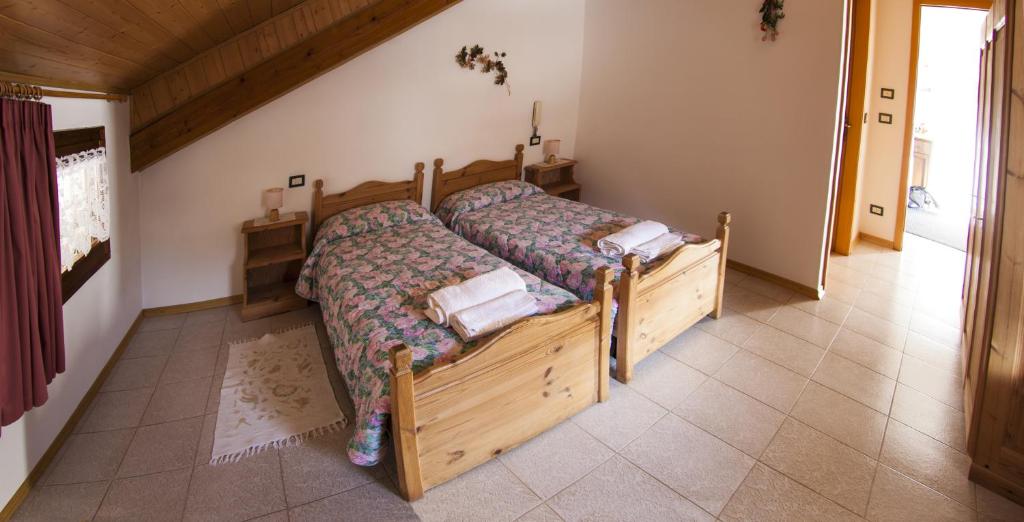 Postel nebo postele na pokoji v ubytování B&B Casa Zeni