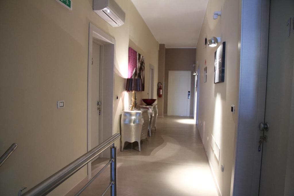 Postel nebo postele na pokoji v ubytování Albergo Del Sole