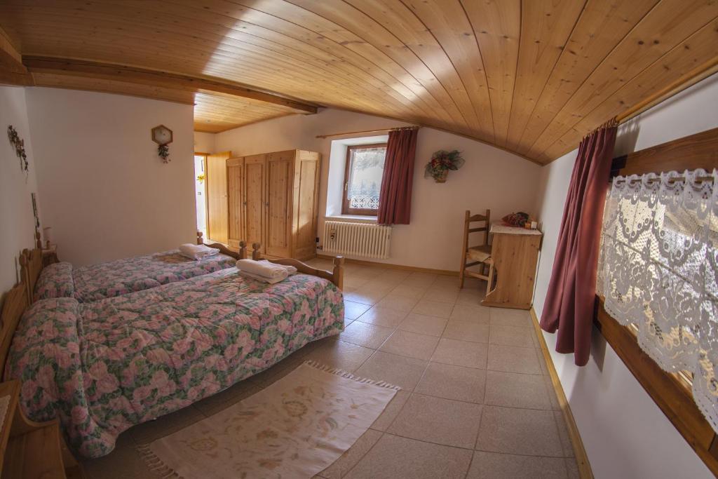 Postel nebo postele na pokoji v ubytování B&B Casa Zeni