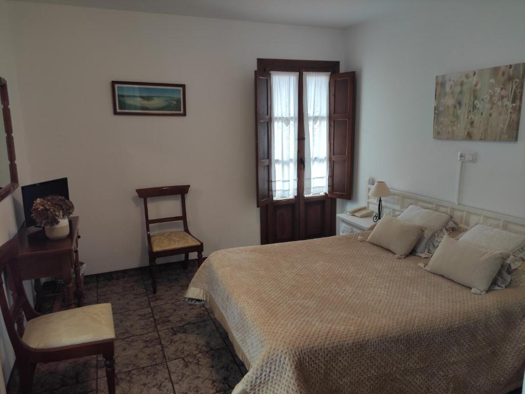 Cama o camas de una habitación en Hotel Solatorre