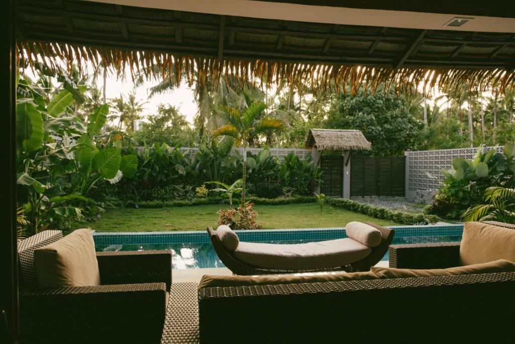Bazén v ubytování Domu Mia Villa Siargao nebo v jeho okolí