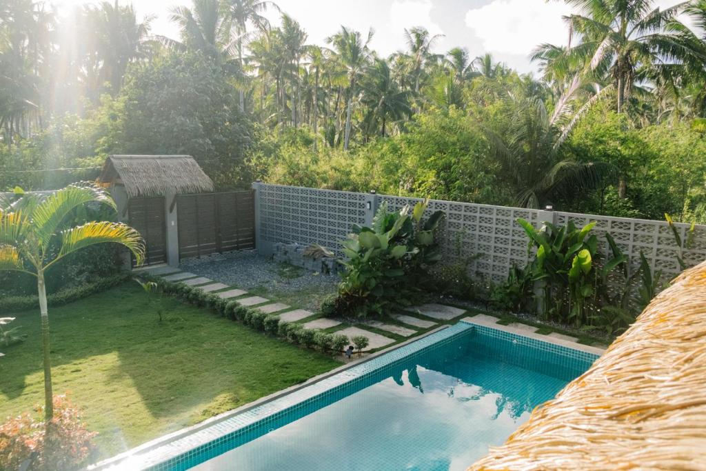Bazén v ubytování Domu Mia Villa Siargao nebo v jeho okolí
