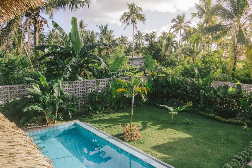 Bazén v ubytování Domu Mia Villa Siargao nebo v jeho okolí