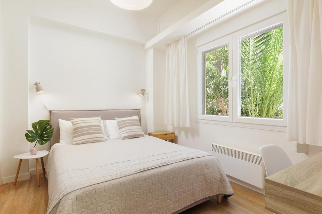 Posteľ alebo postele v izbe v ubytovaní Aloe Apartments