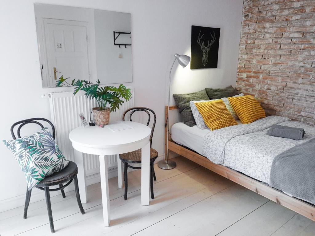 Posteľ alebo postele v izbe v ubytovaní LION apartments - Gold