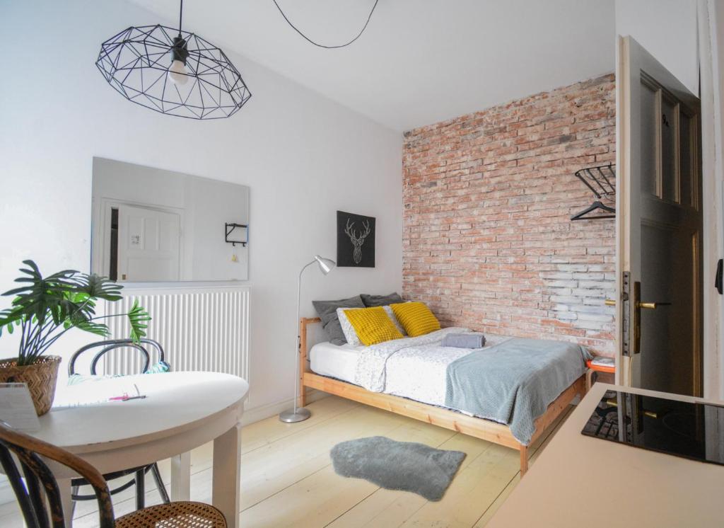 Posteľ alebo postele v izbe v ubytovaní LION apartments - Gold
