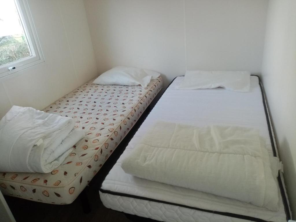 Postel nebo postele na pokoji v ubytování FILEAUX 323