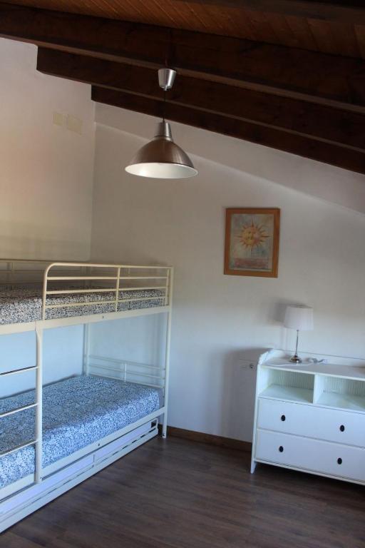 Postel nebo postele na pokoji v ubytování CASA MARGARITA