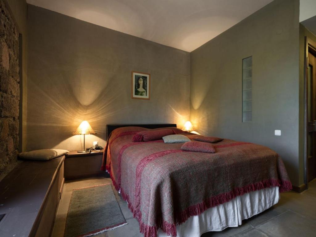 Postel nebo postele na pokoji v ubytování Tufenkian Avan Marak Tsapatagh Hotel