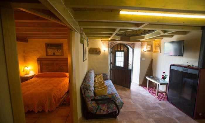 Posteľ alebo postele v izbe v ubytovaní Casa del Cerro es una singular casa rural de fácil acceso