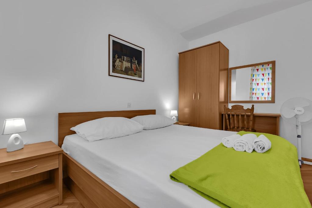 Postel nebo postele na pokoji v ubytování Apartment Marica