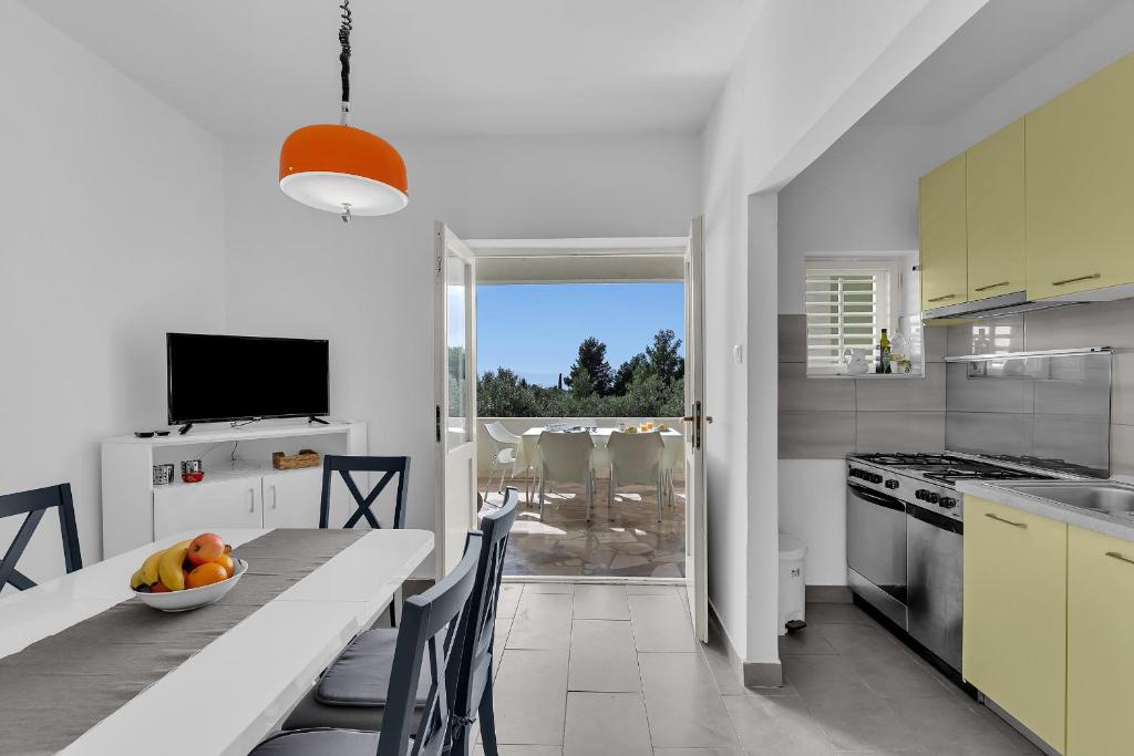 Kuchyň nebo kuchyňský kout v ubytování Apartment Marica
