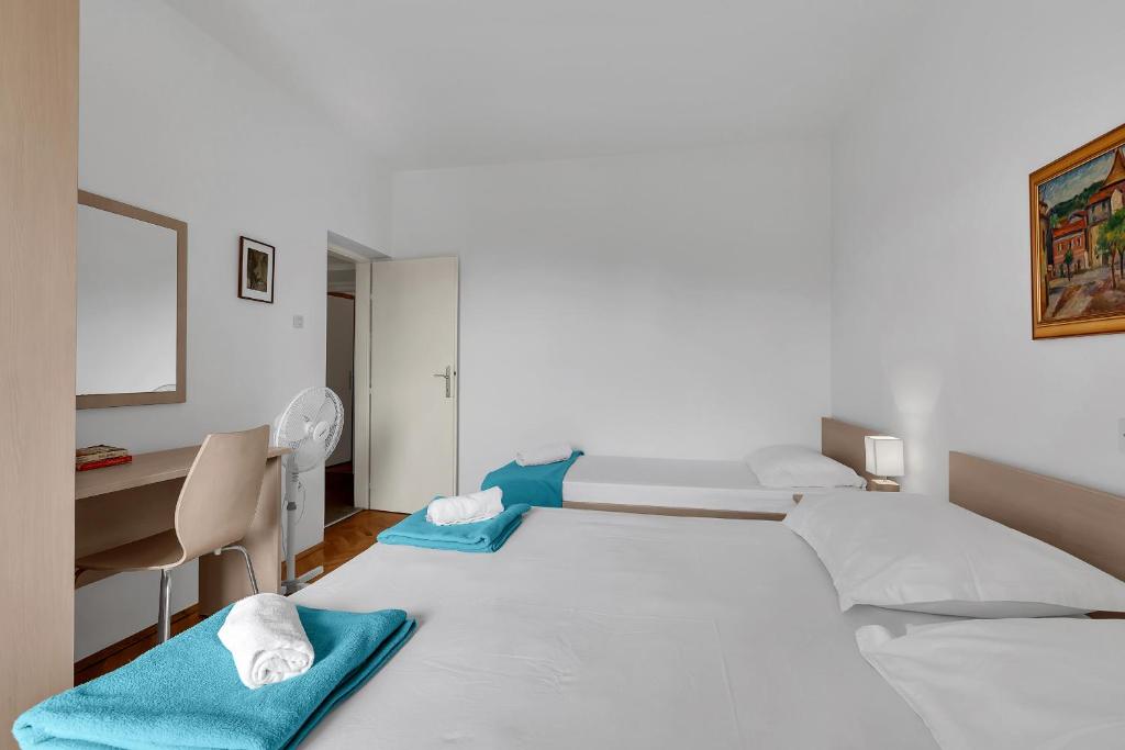Postel nebo postele na pokoji v ubytování Apartment Marica