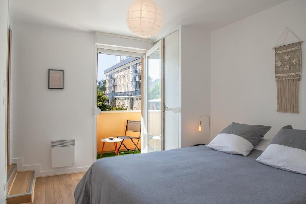 Posteľ alebo postele v izbe v ubytovaní Appartement Élégant à 2 Pas de la Mer
