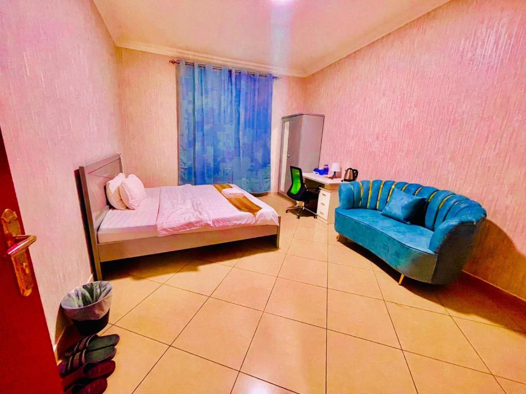 Postel nebo postele na pokoji v ubytování Jin Jie Residence