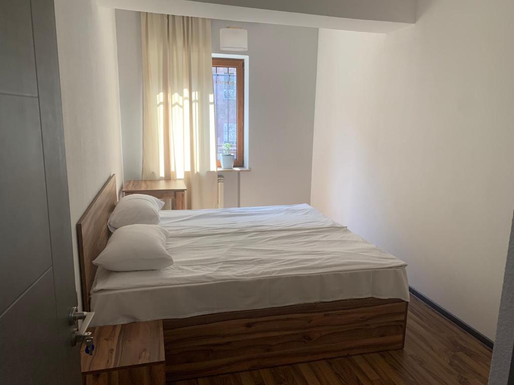 Postel nebo postele na pokoji v ubytování One Day Hostel