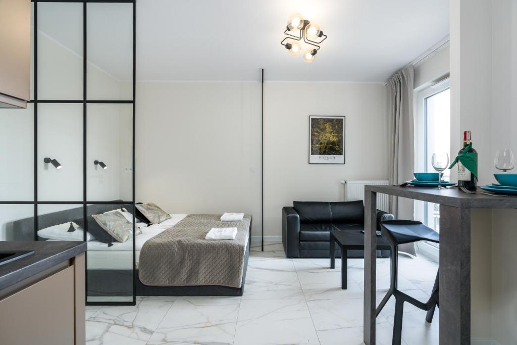 Posteľ alebo postele v izbe v ubytovaní Apartments City View Garbary by Noclegi Renters