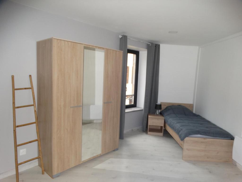Postel nebo postele na pokoji v ubytování L'estaou