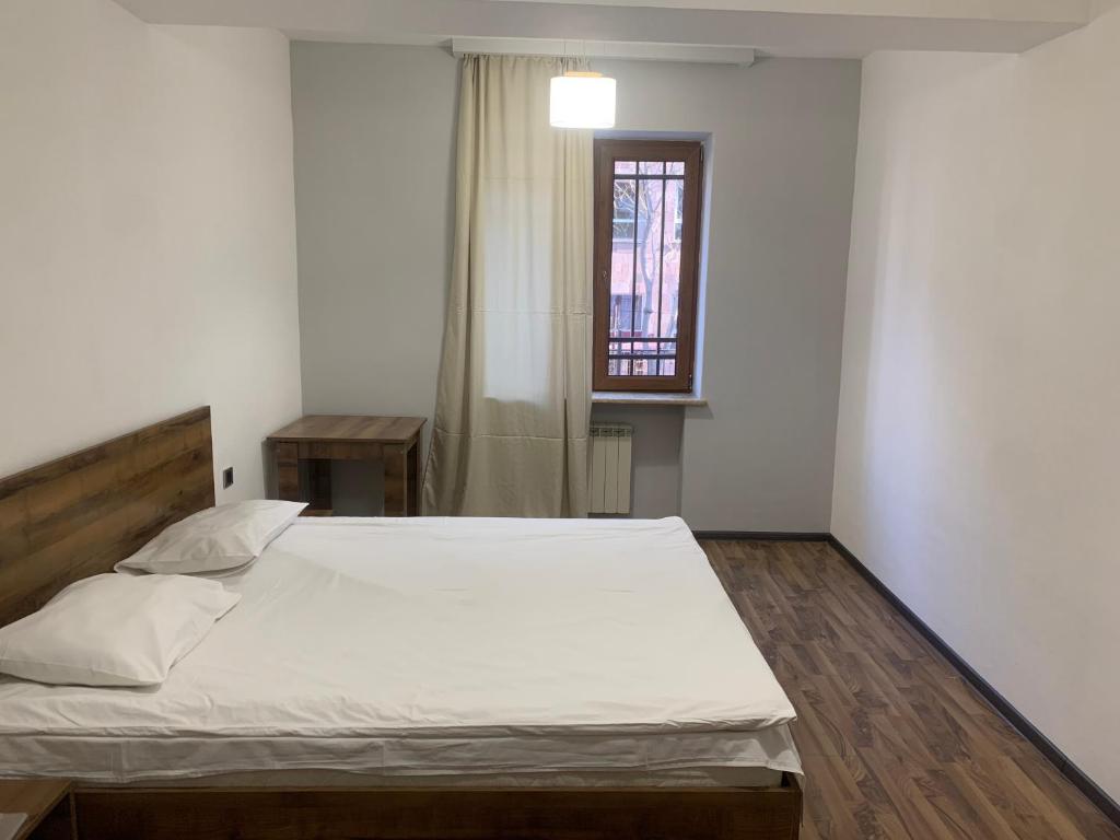 Postel nebo postele na pokoji v ubytování One Day Hostel