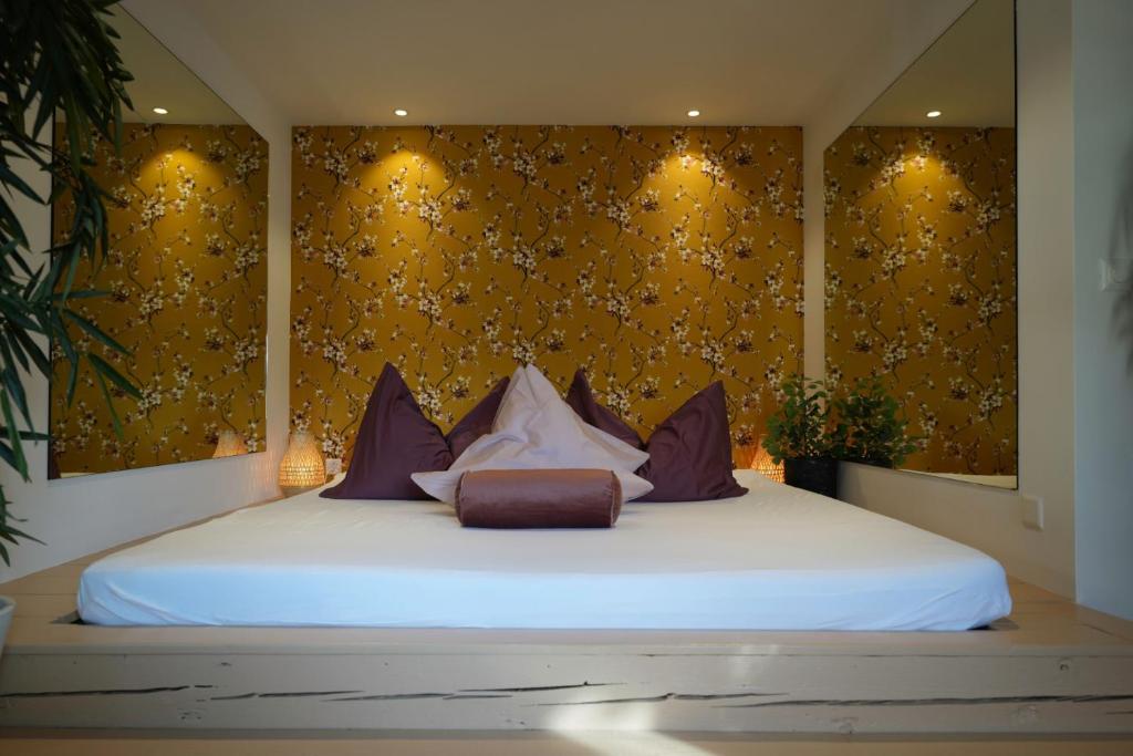 Postel nebo postele na pokoji v ubytování Hotel Zeit & Traum Privat SPA