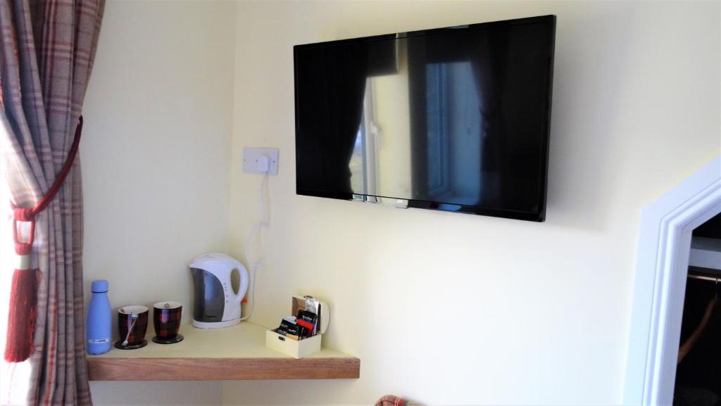 TV a/nebo společenská místnost v ubytování Bracadale House
