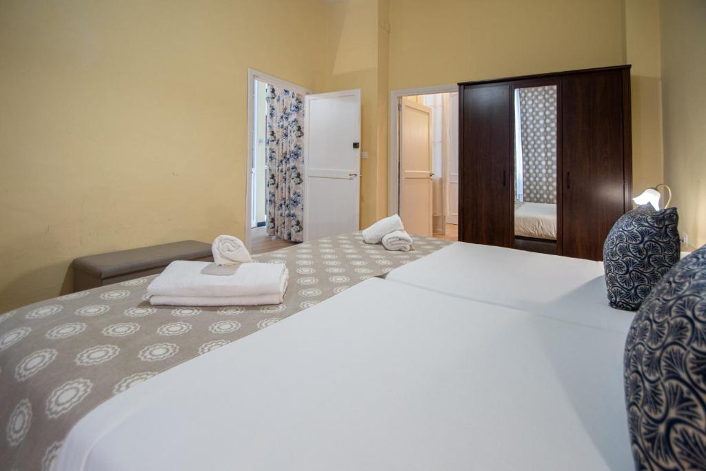 Posteľ alebo postele v izbe v ubytovaní Apartamento Casa Senorial Cadiz